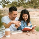 FAQs About the PREPARE-ENRICH Program: Updated - Exceptional Relationship Counseling for Virginia Couples an Asian couple outdoors reading together