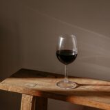 Why Couples Divorce - Exceptional Relationship Counseling for Virginia Couples a glass of wine on a wood bench
