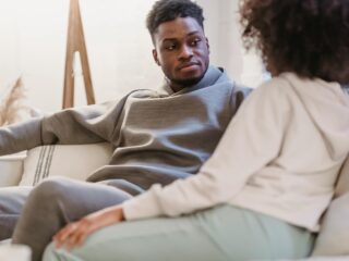 couple-in-casual-clothes-resting-and-talking