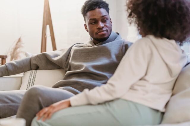 couple-in-casual-clothes-resting-and-talking