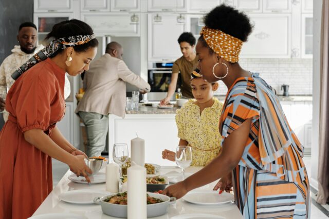family-setting-the-table-for-dinner