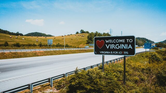 discernment counseling in virginia Welcome to Virginia sign on a sunny highway, inviting travelers in a picturesque rural setting.